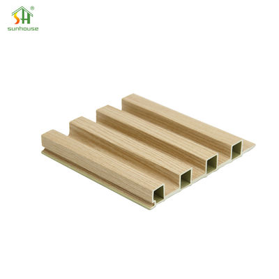 Un buen precio. Los paneles de pared decorativos de WPC ecológicos son resistentes al agua para el diseño de paredes de fondo de televisión. en línea